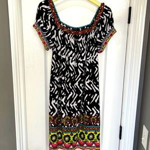 Multi-color dress is perfect for summer! Excellent condition smoke free Size 4
